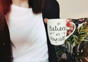 •“Woman reflecting with confidence, symbolizing self-respect”