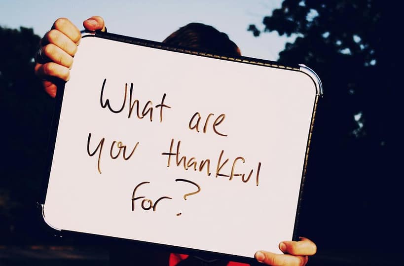 A person journaling gratitude